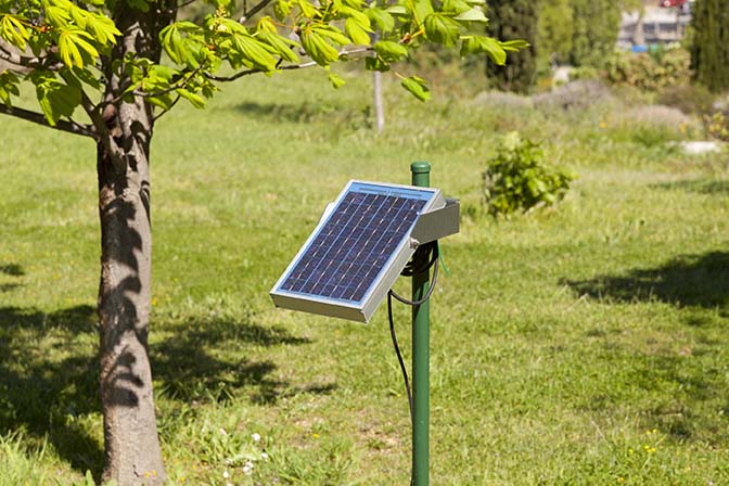Solar panel placed on a garden for automatic irrigation control